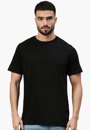 Schwarzes T-Shirt mit kurzen Ärmeln aus Baumwolle, mit Rundhalsausschnitt und klassischer Passform, glatter Textur und ohne sichtbare Muster oder Grafiken.