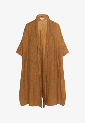 Bruine, oversized gebreide poncho met open voorkant en korte mouwen. De textuur van de stof heeft verticale ribbels, een zachte afwerking en rafelige randen.