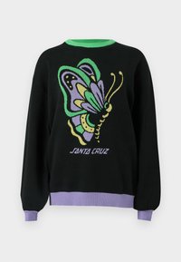 Sweater preto com um gráfico colorido de uma borboleta, gola canelada verde e punhos e barra canelados roxos. Texto "SANTA CRUZ" abaixo do design.