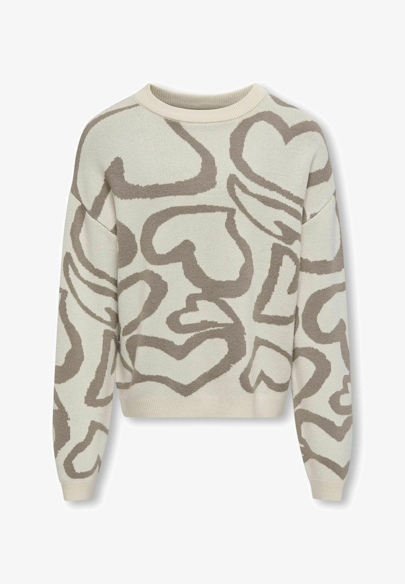 Creme trui met een losse pasvorm, voorzien van abstracte bruine hartpatronen en een ronde halslijn. De mouwen en de onderkant zijn ribbelig.
