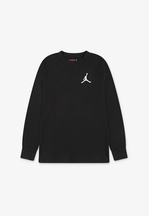 Fekete, hosszú ujjú pamut póló, bal oldalon fehér Jumpman logóval. Puha tapintású, kerek nyakkivágással.