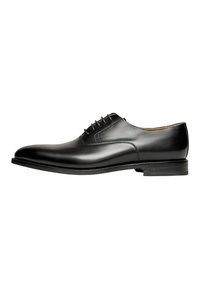 Schwarze Leder-Schnürschuhe mit glatter Oberfläche, runder Zehenpartie und niedrigem, gestapeltem Absatz. Mit dezenten Nähten und einem eleganten Design.