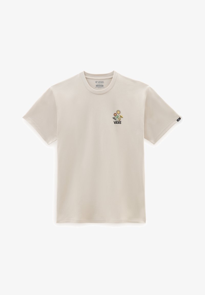 Camiseta de manga corta color crema hecha de algodón, con un gráfico floral que incluye una flor amarilla y la palabra "VANS" en negro debajo de ella.
