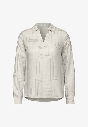 Světlé šedé tričko s dlouhým rukávem a výstřihem do V, se zakřiveným geometrickým vzorem v tmavě šedé barvě. Vyrobeno z jemné texturované tkaniny.