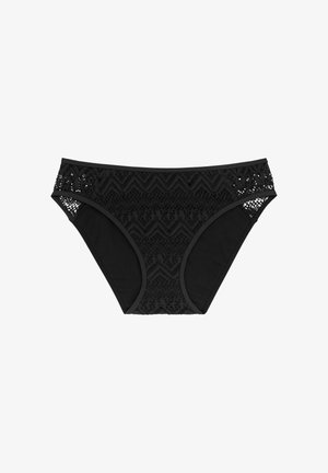 Parte inferior de bikini negra que presenta un diseño combinado de tela suave y encaje de ganchillo con un patrón en zigzag en la cintura y los lados.