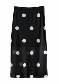 Zwarte rok met witte stippen. Heeft een elastische tailleband en een doorzichtige textuur, die net boven de knie valt. Eenvoudig en klassiek ontwerp.