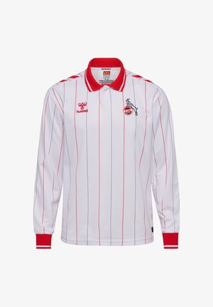Weißes Sporttrikot mit langen Ärmeln, dünnen roten vertikalen Streifen, rotem Kragen und Bündchen sowie dem 1. FC Köln-Logo mit springender Ziege auf der Brust.