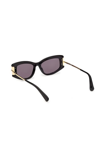 Black cat-eye sunglasses with dark lenses and thin gold arms on white background.