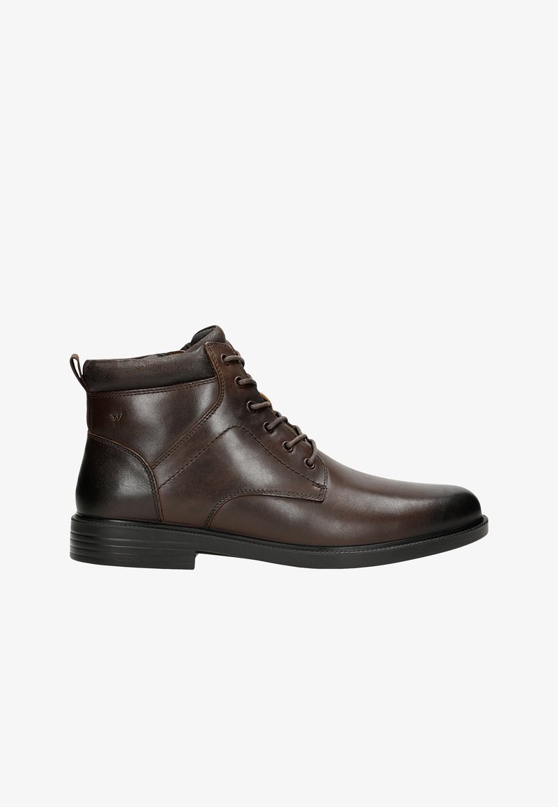 Bottines en cuir marron à finition lisse, bout rond, laçage à six œillets et semelle en caoutchouc texturée basse. Agrémentées d'une languette de traction.