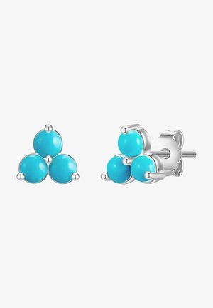 Boucles d'oreilles en argent avec trois pierres turquoise en forme de clou. Pierres rondes et lisses disposées en formation triangulaire pour un look moderne.