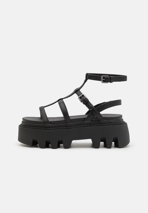 Sandalen met plateauzool - black