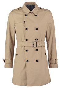 Cappotto trench beige con design doppiopetto, bottoni neri, cintura in vita, spalline e tasca laterale.