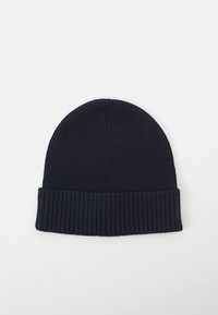 Bonnet tricoté navy avec un revers côtelé, une texture douce et un design sans couture, idéal pour les temps froids.