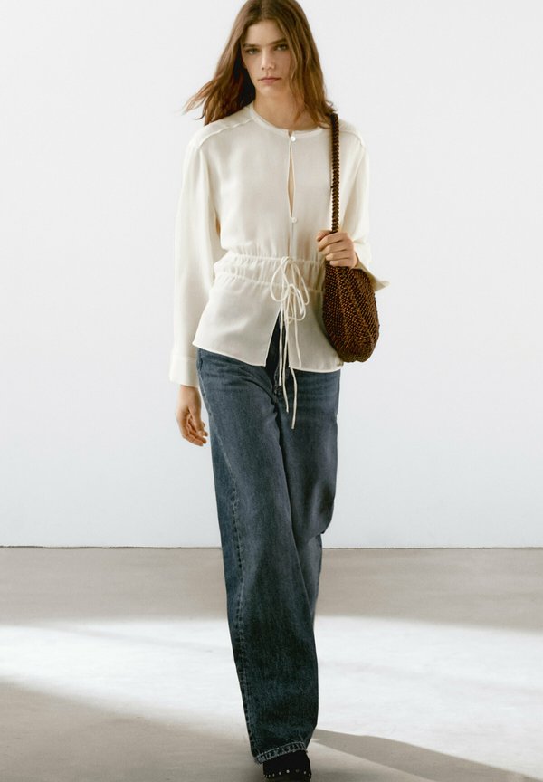 SEMITRANSPARENT FLOWING WITH BOWS - Button-down blouse - beige