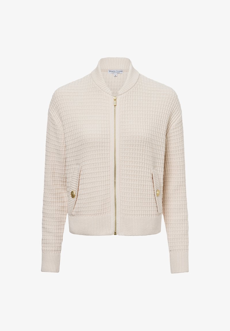 Cremefarbener Cardigan mit Waffelstruktur, mit Reißverschluss vorne, goldenen Beschlägen und seitlichen Taschen mit Knopfdetails. Rippbündchen und Saum.