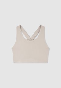 Reggiseno sportivo beige chiaro con design accorciato, spalline larghe e schiena incrociata. Realizzato in un materiale liscio e elastico.