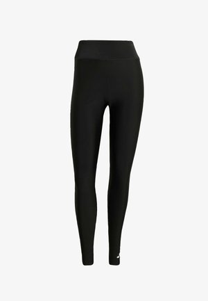 Crne helanke visokog struka pune dužine napravljene od glatkog, rastezljivog materijala s malim bijelim logom blizu lijeve gležnje.