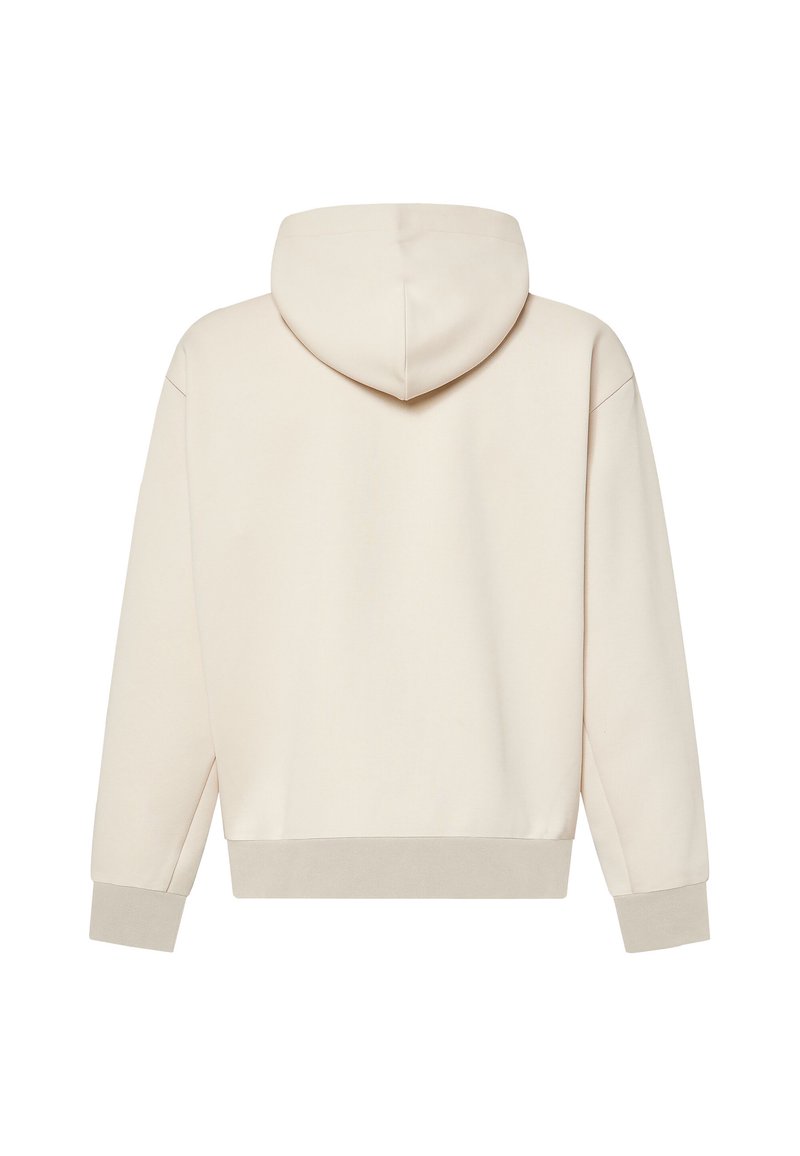 Sweat à capuche beige avec manches longues, poignets et taille côtelés, montré de dos sur fond blanc.