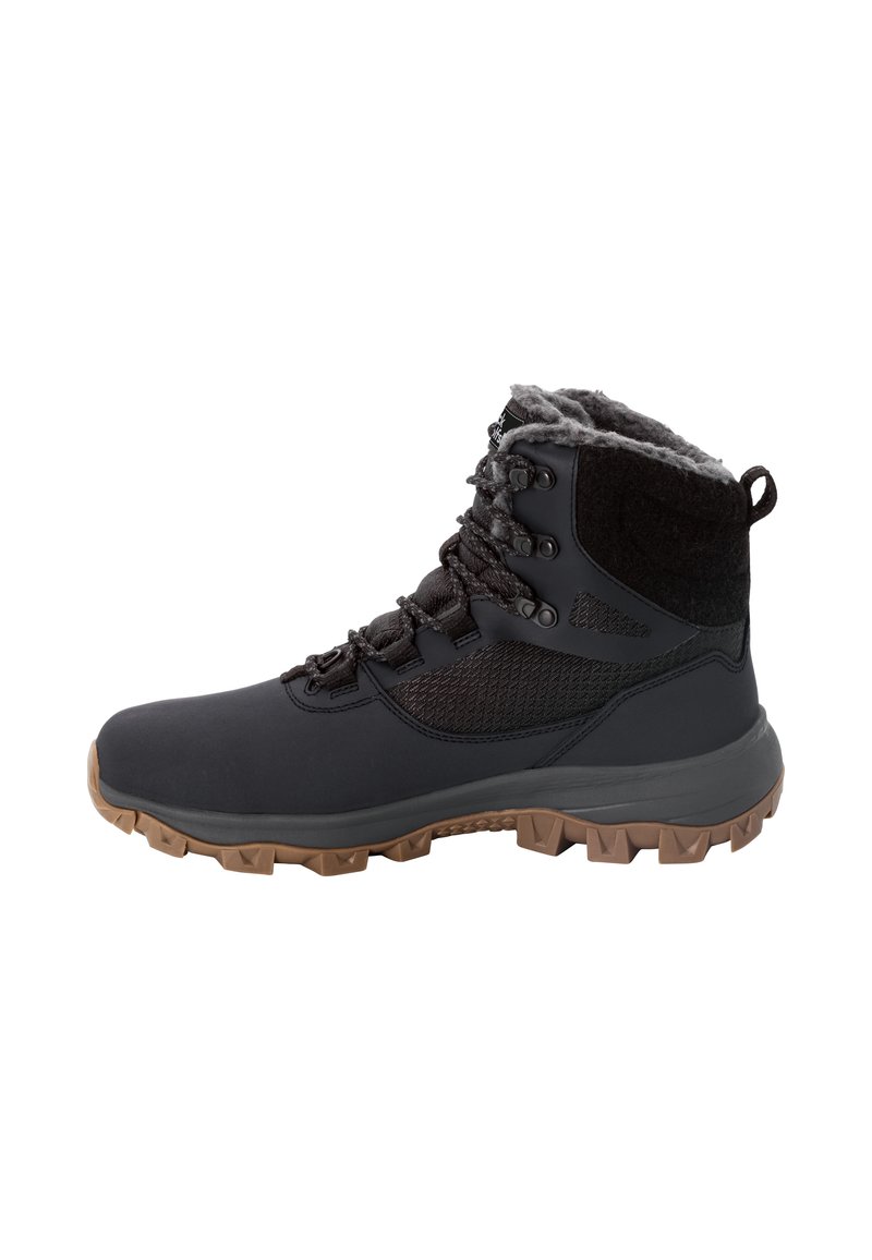 Zwarte waterdichte boots met een getextureerde bovenkant, grijze fleece voering en een robuuste rubberen zool met multidirectionele gripnoppen.