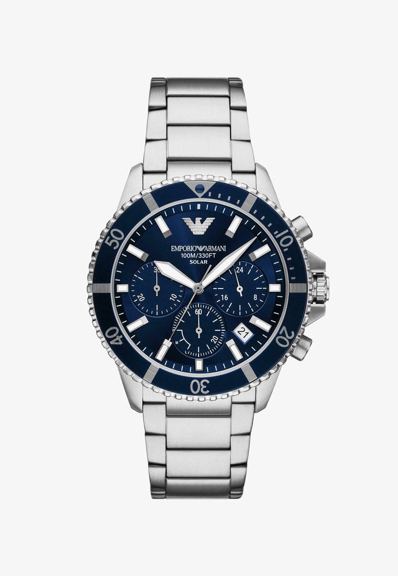 Orologio in acciaio inossidabile silver con quadrante blu, tre sottocronografi e una finestra per la data. Presenta una lunetta girevole e un meccanismo a energia solare.