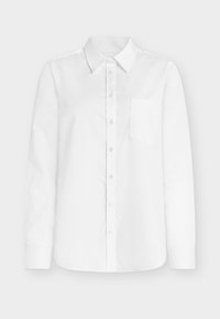 Λευκό πουκάμισο μακρυμάνικο από βαμβάκι, με μυτερό γιακά, πλήρες κούμπωμα με κουμπιά και τσέπη στο αριστερό μέρος του στήθους. Απαλή υφή.