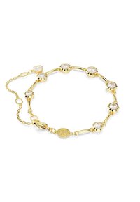 Gouden armband met ronde, heldere kristallen geplaatst in ronde monturen, verbonden door langwerpige vormen, voorzien van een karabijnsluiting en een verstelbare ketting.