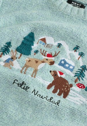Hellgrüner Strickpullover mit festlichem Stickdesign eines Rentiers, Bären, Kaninchens und winterlicher Landschaft, mit dem Text "Feliz Navidad".