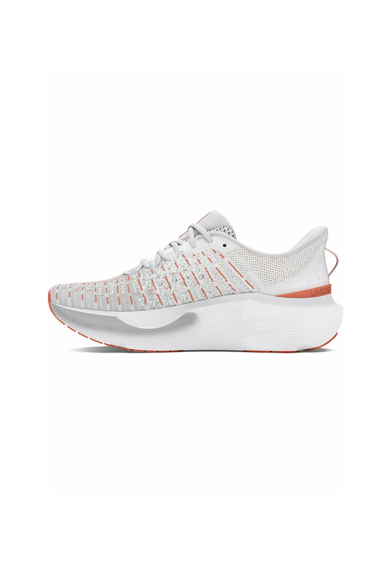 Sport shoes with a breathable white mesh upper featuring orange accents. Thick white sole with textured grip and minimal design elements.
