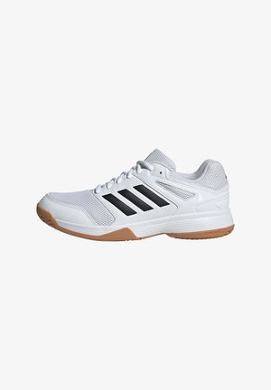 White athletic shoe with black striped accents, mesh upper, cushioned sole, and rubber outsole. Designed for comfort and support in sports.