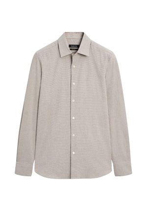 Chemise beige à manches longues avec col pointu et poignets à un seul bouton, conçue pour une coupe ajustée et des occasions formelles.