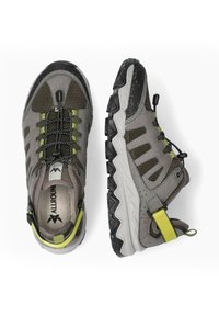 Grey and olive hiking shoes with black soles, yellow pull tabs, and elastic no-tie laces, shown top and side view on white background.
