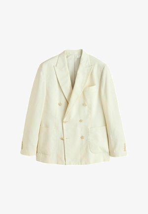 Cremefarbener, doppelt geknöpfter Blazer mit Spitzrevers, sechs Knöpfen, Brusttasche, zwei unteren aufgesetzten Taschen und Knöpfen an den Manschetten.