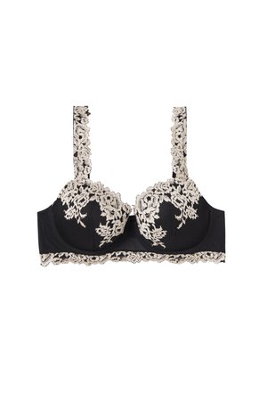 Soutien-gorge noir avec superposition de dentelle florale beige sur les bonnets, les bretelles et le bandeau, offrant un soutien armaturé et un bord en dentelle festonné.