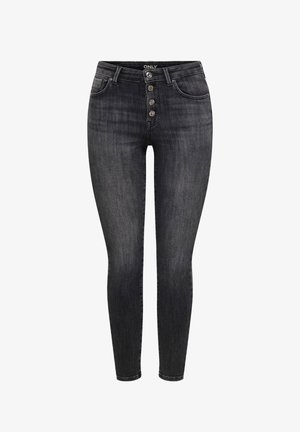 Jean skinny noir taille haute avec fermeture à boutons et poches avant, présentant une légère texture délavée et une coupe ajustée.