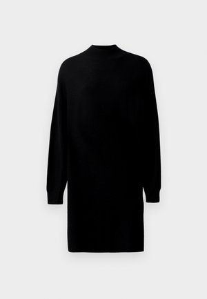 Schwarzes Langarm-Strickkleid mit hohem Halsausschnitt und geradem, lockeren Schnitt, vor einem schlichten hellen Hintergrund präsentiert.