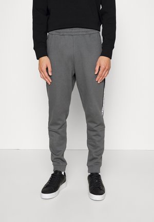 Pantalones deportivos - dark grey