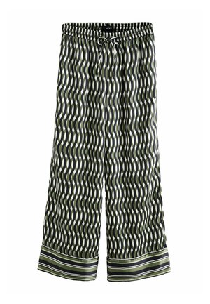 Pantalon à jambes larges avec ceinture élastique et lien, avec des rayures verticales ondulées vertes et noires et des poignets rayés horizontaux.