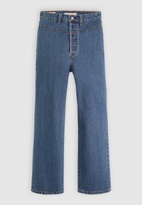 Jean denim bleu à coupe droite avec bouton avant visible et passants de ceinture, présenté sur un fond clair uni.