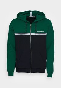 Felpa con cappuccio e zip in tessuto misto cotone verde e nero, caratterizzata da strisce bianche sul petto e tasche frontali.