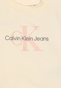 Calvin Klein Jeans MONOGRAM UNISEX SET - Melegítő - afterglow/pink sand