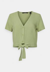 Blusa corta a maniche corte, con scollo a V, in tessuto verde chiaro, con chiusura a bottoni e dettaglio con cordino all'orlo. Texture liscia.