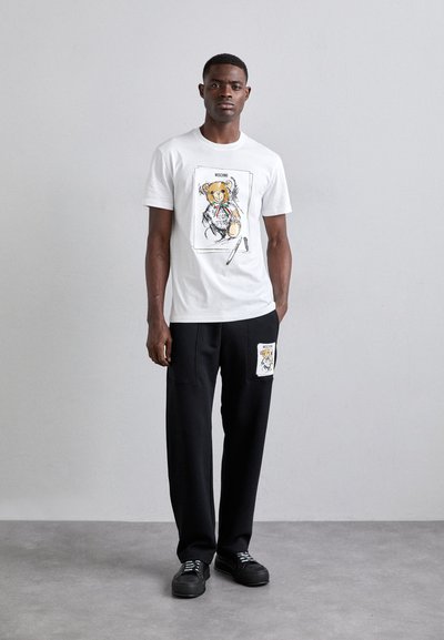 MOSCHINO T-shirt imprimé - fantasia bianco