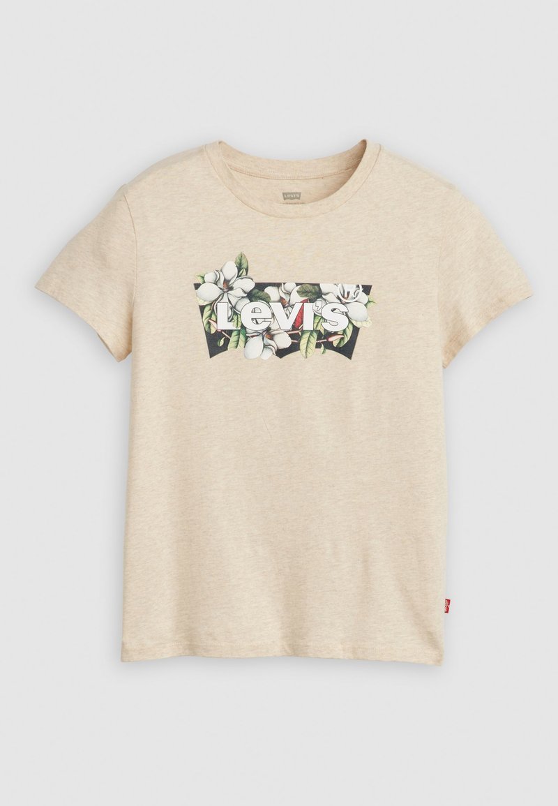 T-shirt beige à manches courtes avec un graphique floral représentant des magnolias et le texte "Levi's" en blanc sur fond noir.