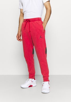 AIR PANT - Pantaloni sportivi - gym red/black
