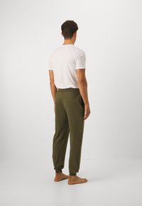 BOSS MIX MATCH - Donji dio pidžame - dark green seven
