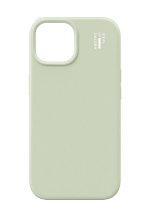Funda para teléfono de silicona verde claro con gran corte para cámara y logo "Ideal of Sweden" en blanco en la esquina superior derecha.