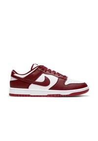 Nike Dunk Low sneakers, featuring a maroon and white leather upper, perforated toe box, and a rubber sole with red accents.