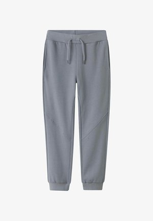 Graue Sweatpants aus weichem Material, mit einem gerippten Bund, Taschen, schmal zulaufenden Bündchen und diagonalen Designelementen.