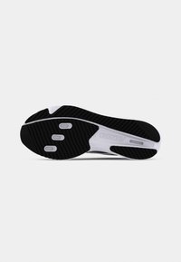 Black rubber sneaker sole with white accents. Features textured grip patterns and multiple circular indentations for traction.