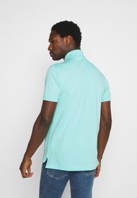Tommy Hilfiger REGULAR - Polo - miami aqua